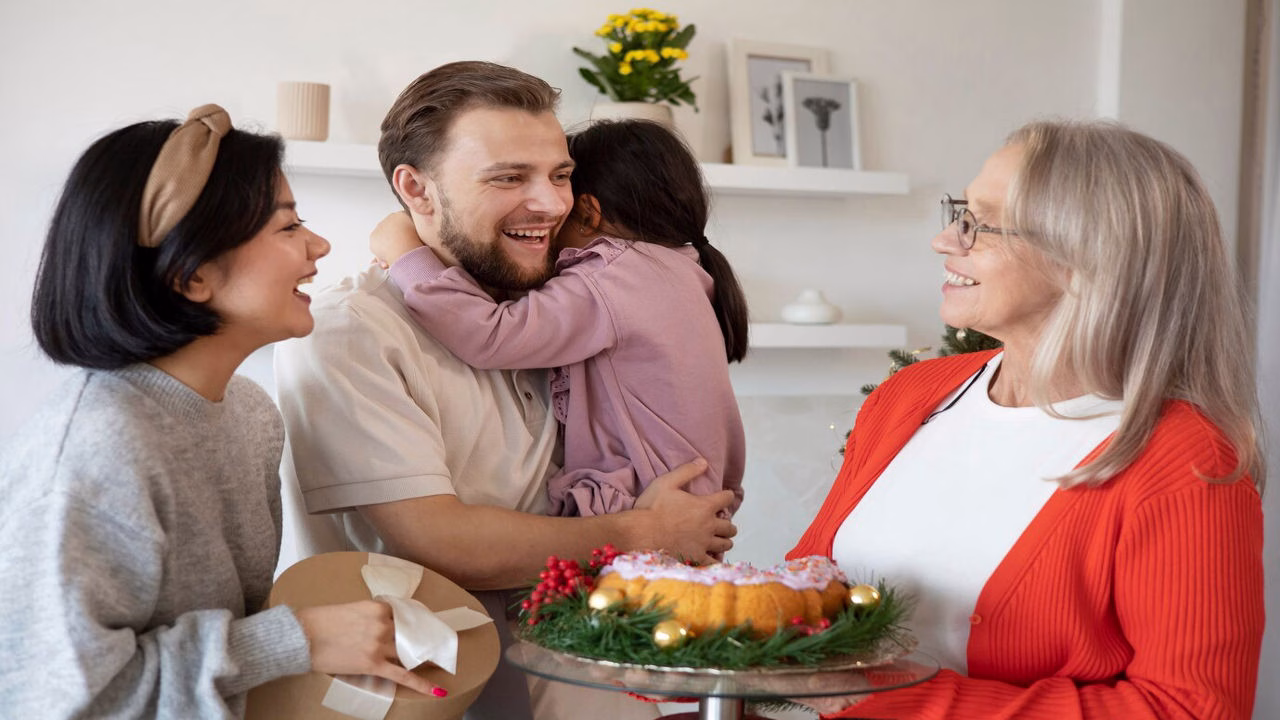 a Family Member Handing Fatherâ€™s Day Wishes to Their Uncle with a Smile
